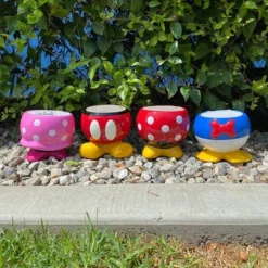 Disney 7" Wide Mickey Mouse Ceramic Indoor Outdoor Planter Pot Multicolor -Garden Promotional Store GUEST 1bbe5fa3 3f4f 4135 9c9b fb011c2b4ba3