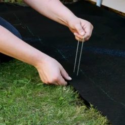 Sunnydaze Decor Sunnydaze UV Resistant Landscape Fabric Weed Barrier Fabric With Landscape Staples -Garden Promotional Store GUEST 7c270fef 1dd3 4f4b 9419 7027a0616c00